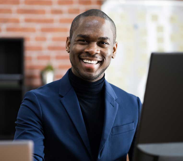 Happy-Employees-Working-at-a-Desk